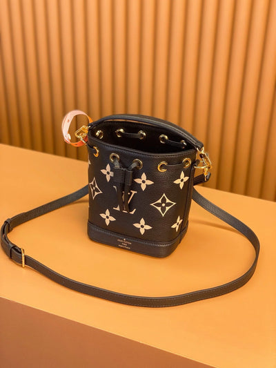 0528 Nano Noé Bicolour Monogram Empreinte Leather