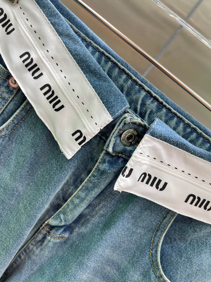 0528 Jeans with logo on waist