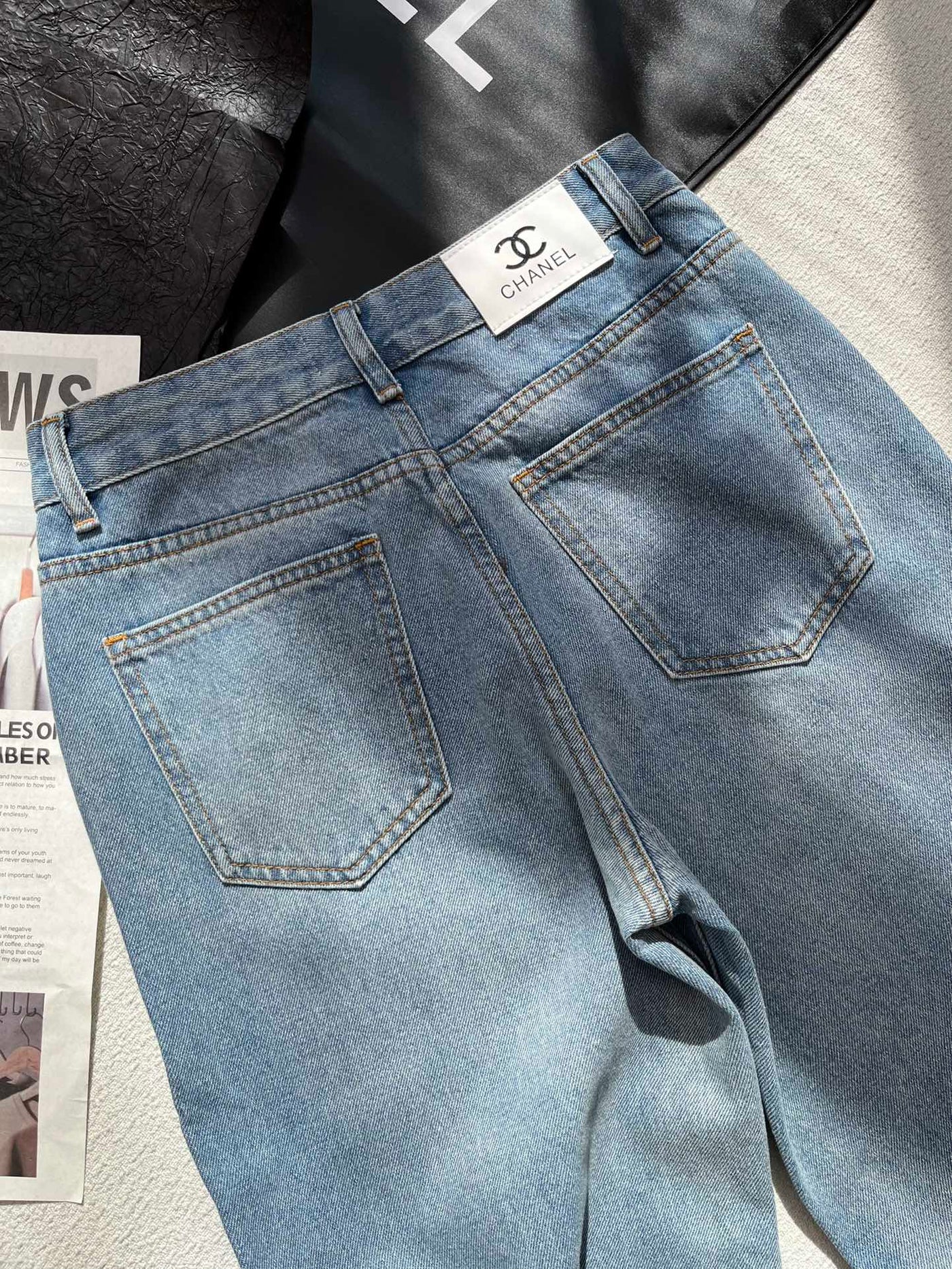 0528 Embossed letter jeans